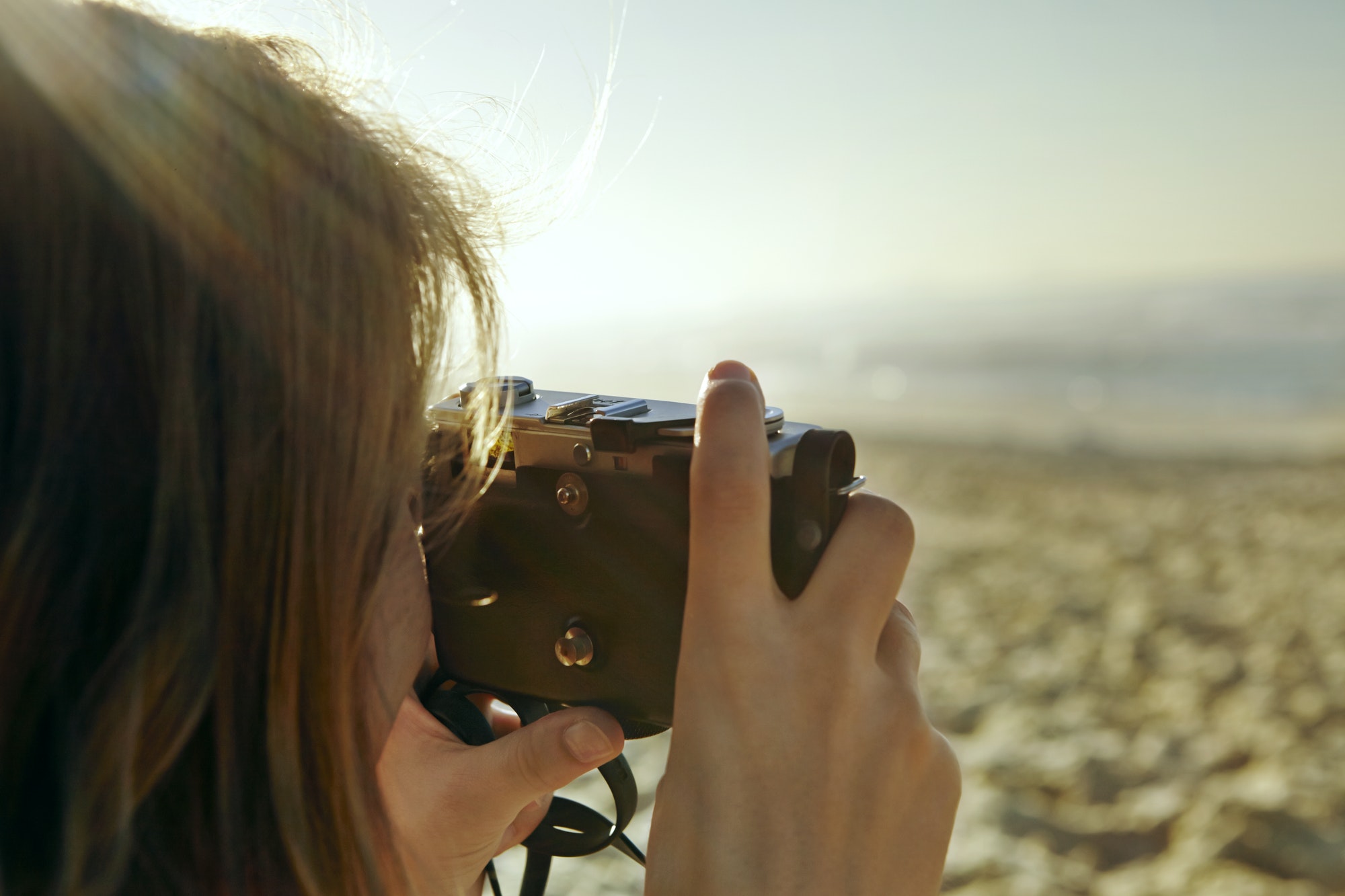 Woman Photographing At Beach